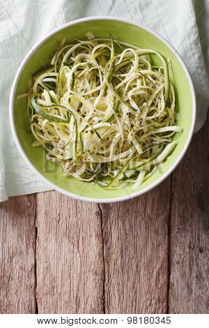 Useful Raw Zucchini Pasta In A Bowl Close Up. Vertical Top View