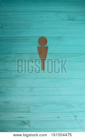 Men symbol Toilet sign. Blue wooden wall background.