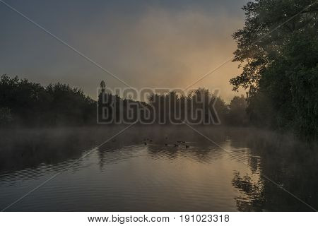 Sunrise near ponds in Dacice town in spring sunny morning