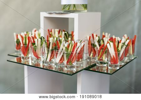 Appetizer of fresh cucumbers, asparagus and pepper, party finger food