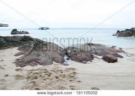 Beach on the island in the middle of the sea on a perfect holiday.