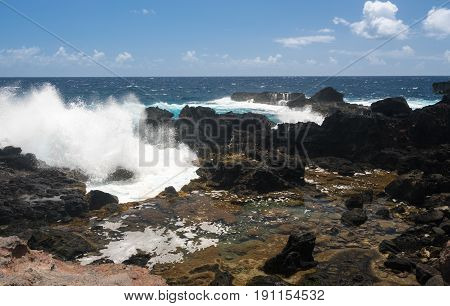 Rugged and beautiful Olivine pools on coastline around north east of Hawaiian island of Maui on Kahekili highway