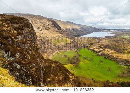 A Beautiful Irish Mountain Landscape With A Lake In Spring. Gleninchaquin Park In Ireland.