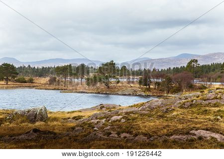 A Beautiful Irish Mountain Landscape With A Lake In Spring. Gleninchaquin Park In Ireland.