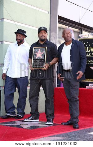 LOS ANGELES - JUN 12:  William Loshawn Calhoun Jr aka WC, Ice Cube, John Singleton at the Ice Cube Star Ceremony on the Hollywood Walk of Fame on June 12, 2017 in Los Angeles, CA