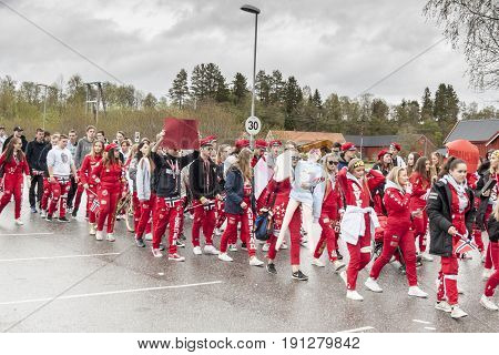 VERDAL NORWAY - MAY 17 2017: National day in Norway. Norwegians at traditional celebration and parade on may 17 2017 in Verdal. People on parde before school in Verdal. Constitution Day is the National Day of Norway.