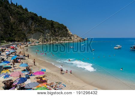 AGIOS NIKITAS, LEFKADA, GREECE JULY 16, 2014: Blue waters of beach of village of Agios Nikitas, Lefkada, Ionian Islands, Greece