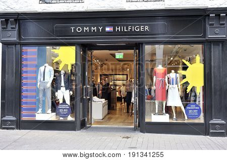 Shop Street, Galway, Ireland June 2017, Tommy Hilfiger Store, Girl Shoping.