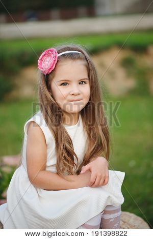 photo of young beautiful girl with long hair