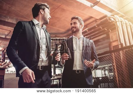 Businessmen In Bar