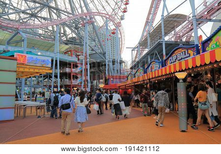YOKOHAMA JAPAN - MAY 28, 2017: Unidentified people visit Cosmo World. Cosmo World is an amusement park located in Minato Mirai downtown area in Yokohama.