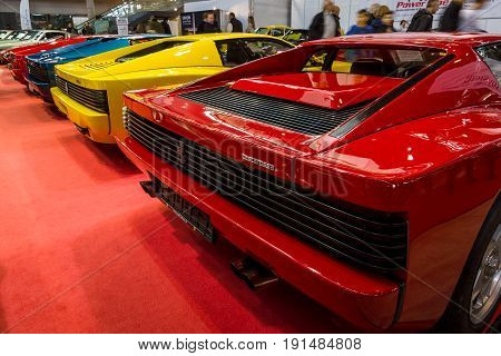 STUTTGART GERMANY - MARCH 02 2017: Rear view of various modifications of sports cars Ferrari Testarossa and F512. Europe's greatest classic car exhibition 