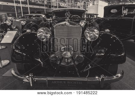 STUTTGART GERMANY - MARCH 02 2017: Luxury car Mercedes-Benz Typ 320 Cabriolet D (W142) 1939. Stylization. Black and white. Europe's greatest classic car exhibition 