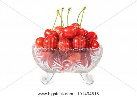 Cherry in dish isolated on white background
