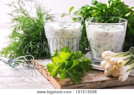 Ayran With Fresh Herbs. Traditional Turkish Yoghurt Drink.