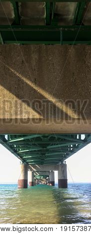 Under the Mackinac Bridge that stands over the Straits of Mackinac, Michigan