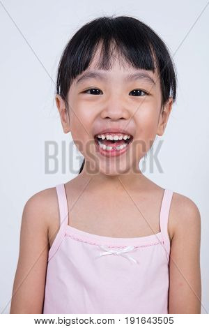 Happy Asian Chinese Little Girl With Toothless Smile