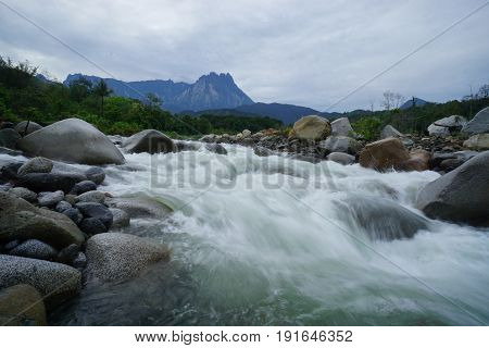 Melangkap River with Mount Kinabalu on background