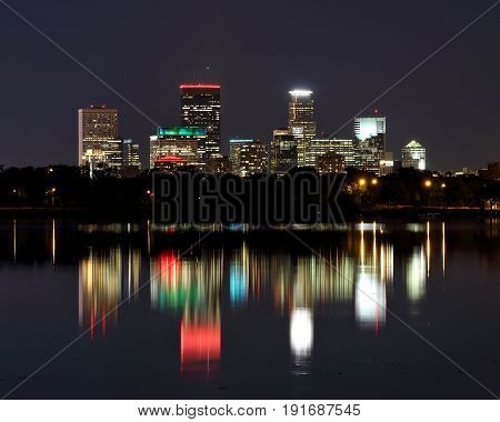 Minneapolis Skyscrapers Reflecting In Lake Calhoun At Night