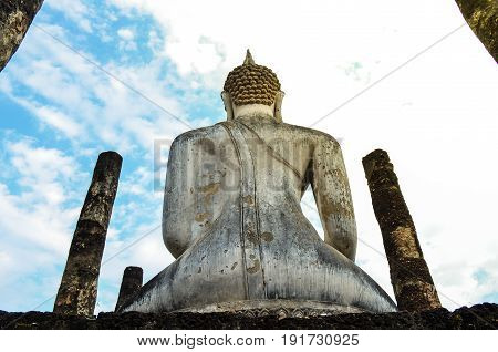 close up on behind ancient Buddha sitting Abstract background with effect filter.
