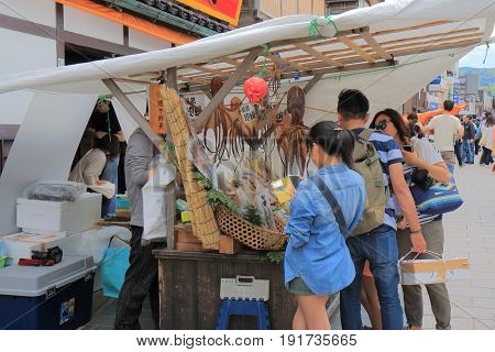 ISHSIKAWA JAPAN - MAY 5, 2017: Unidentified people visit dried octopus shop at Wajima Asaishi street market. Asaichi is one of the top 3 mating street market in Japan.