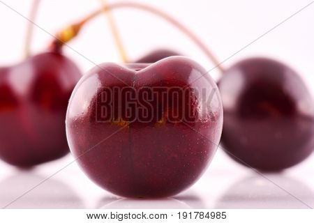 Sweet red cherry isolated on white background