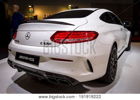 STUTTGART GERMANY - MARCH 03 2017: Compact luxury car Mercedes-AMG C63 S Coupe 2016. Rear view. Europe's greatest classic car exhibition 