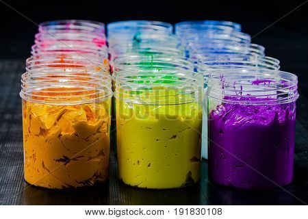 ink or paint for printing on fabric there are several types. The ink used for printing on dark fabric always use plastisol ink. it useful for white fabric too