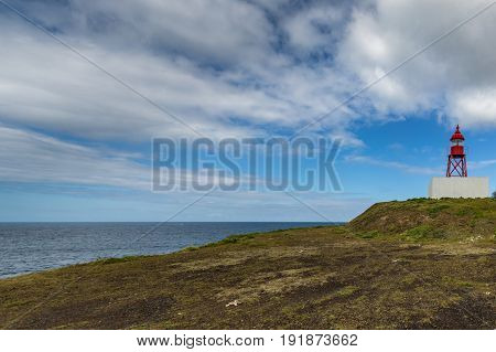 Small Lighthouse Near The Port Of Ponta Delgada