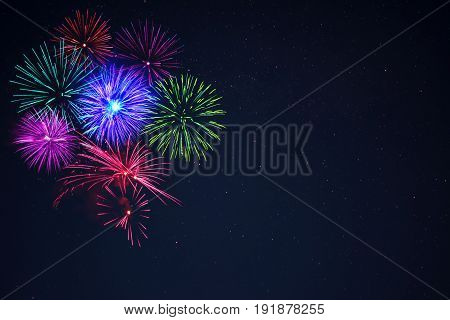Pink Purpe Blue Green Fireworks Over Night Sky