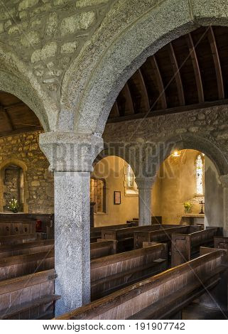 Zennor England - April 26 2017: Interior of the church of Zennor with pillars and benches Saint Senara Church.