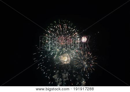 Big colorful fireworks with many  black night sky