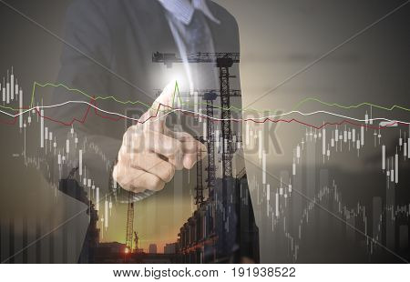 business hand point Trading Stock Graph Chart industry construction. invesment analysis concept.