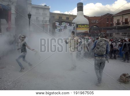 6TH JANUARY 2015 PASTO COLOMBIA - children throwing white powder at each other celebrating at the Carnival de Blancos y Negros (Blacks and White Carnival) in Pasto in Colombia