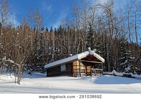 Dawson City, Yukon, Canada, March 10, 2019 : Poet Robert Service Cabin. Dawson City Is Linked To The