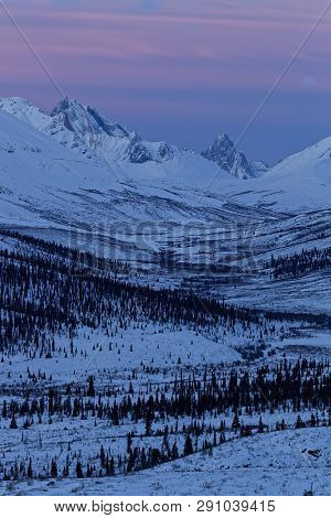 Sunrise On Tombstone National Park Mountains In Winter
