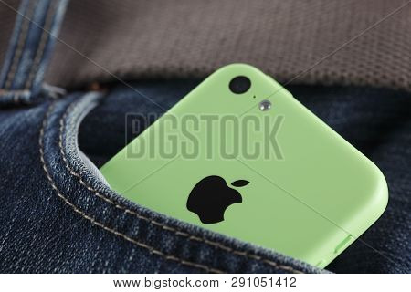 Tambov, Russian Federation - October 16, 2013  Apple Iphone 5c Green Color In A Pocket Of Jeans. Stu