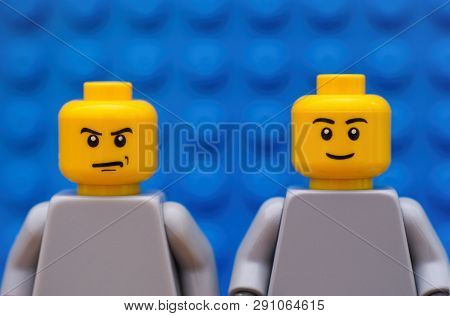 Tambov, Russian Federation - July 24, 2016 Two Lego Minifigures - One Strict And One Smiling. Blue B