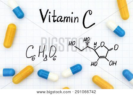 Chemical Formula Of Vitamin C And Pills.
