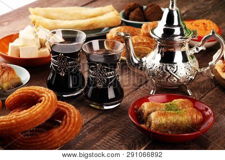 Middle Eastern Or Arabic Dishes And Assorted Meze, Concrete Rustic Background. Turkish Bread Or Turk