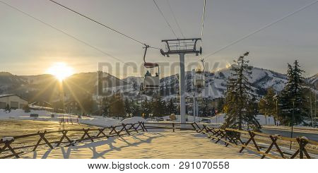 Ski Lifts In Patk City Against Mountain And Sun