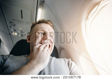 Concept Aerophobia. Afraid Of Fear Flying On An Airplane And At Height.