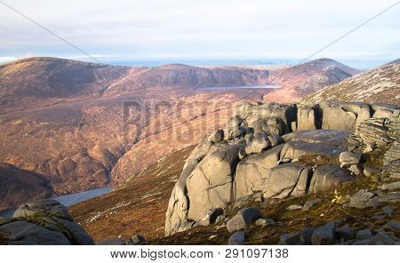 Weathered Rock Sits On The Peak Of Slieve Binnian In The Mourne Mountains, Northern Ireland, Uk.