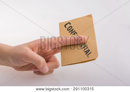 Brown Paper  Text Confidental On A White Background