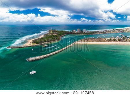 Drone view of famous Mooloolaba beach and marina on sunny day