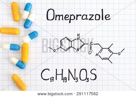 Chemical Formula Of Omeprazole With Some Pills. Close-up.