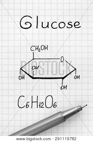 Chemical Formula Of Glucose With Black Pen. Close-up.