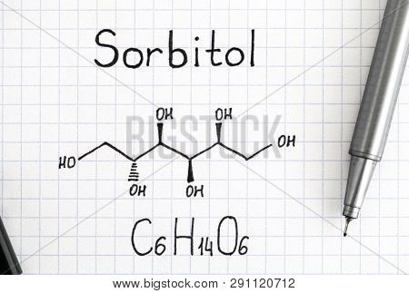 Chemical Formula Of Sorbitol With Black Pen. Close-up.