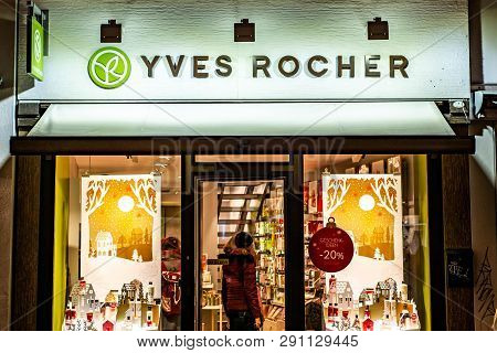 Bonn, Germany 17.12.2017 People Visit Yves Rocher Cosmetic Store. Yves Rocher Was Founded In 1959