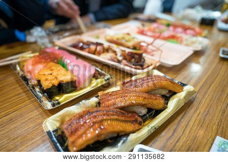 Eel Sushi, And Others Sushi; Salmon, Otoro, Shabby, Grilled Shrimp, Crab Are Arranged On The Table R